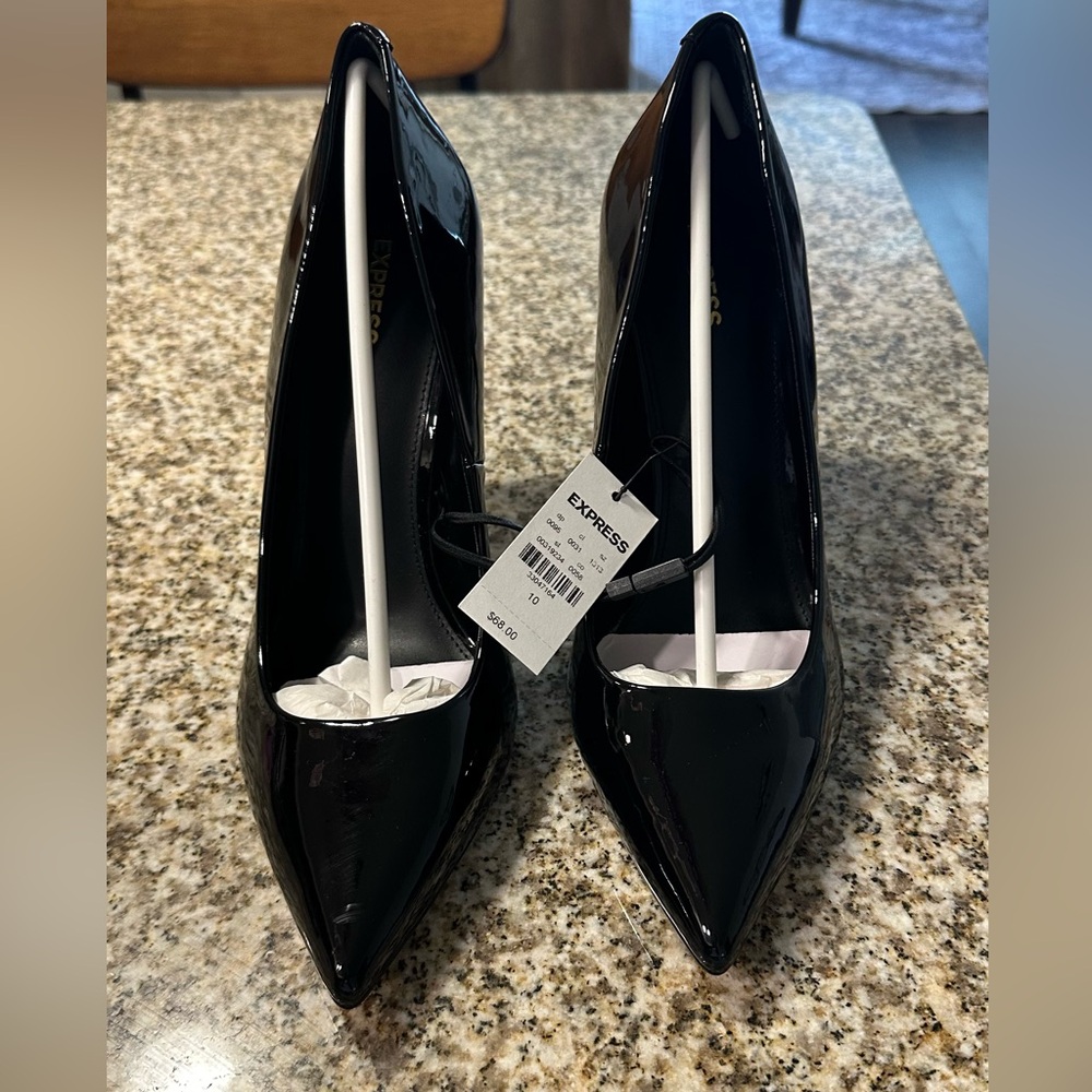 Express - 4 1/2” black patten leather heals